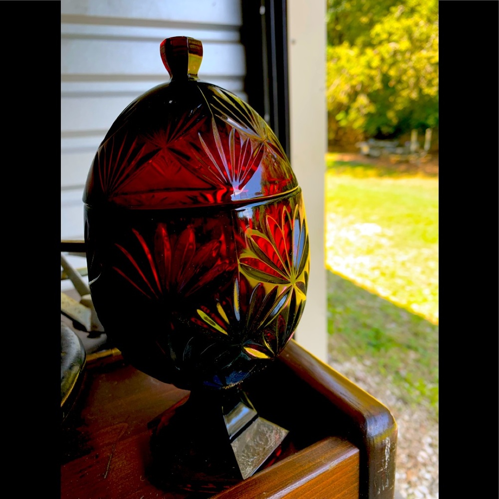 Egg shaped ruby candy holder.